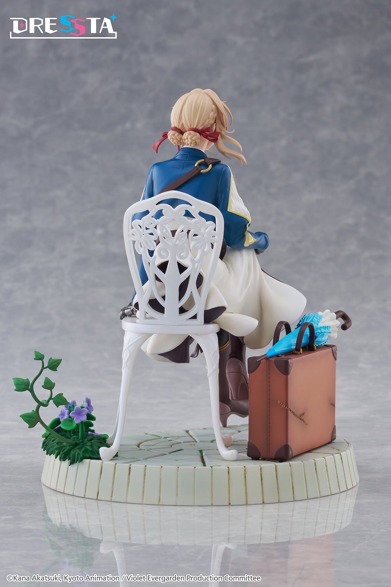 Rear view of Violet Evergarden DRESSTA figure showing the lattice design of the white chair and braided hair detail