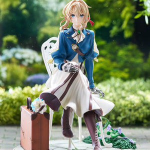 Outdoor garden diorama display of Violet Evergarden DRESSTA statue sitting on a paved patio chair surrounded by green foliage