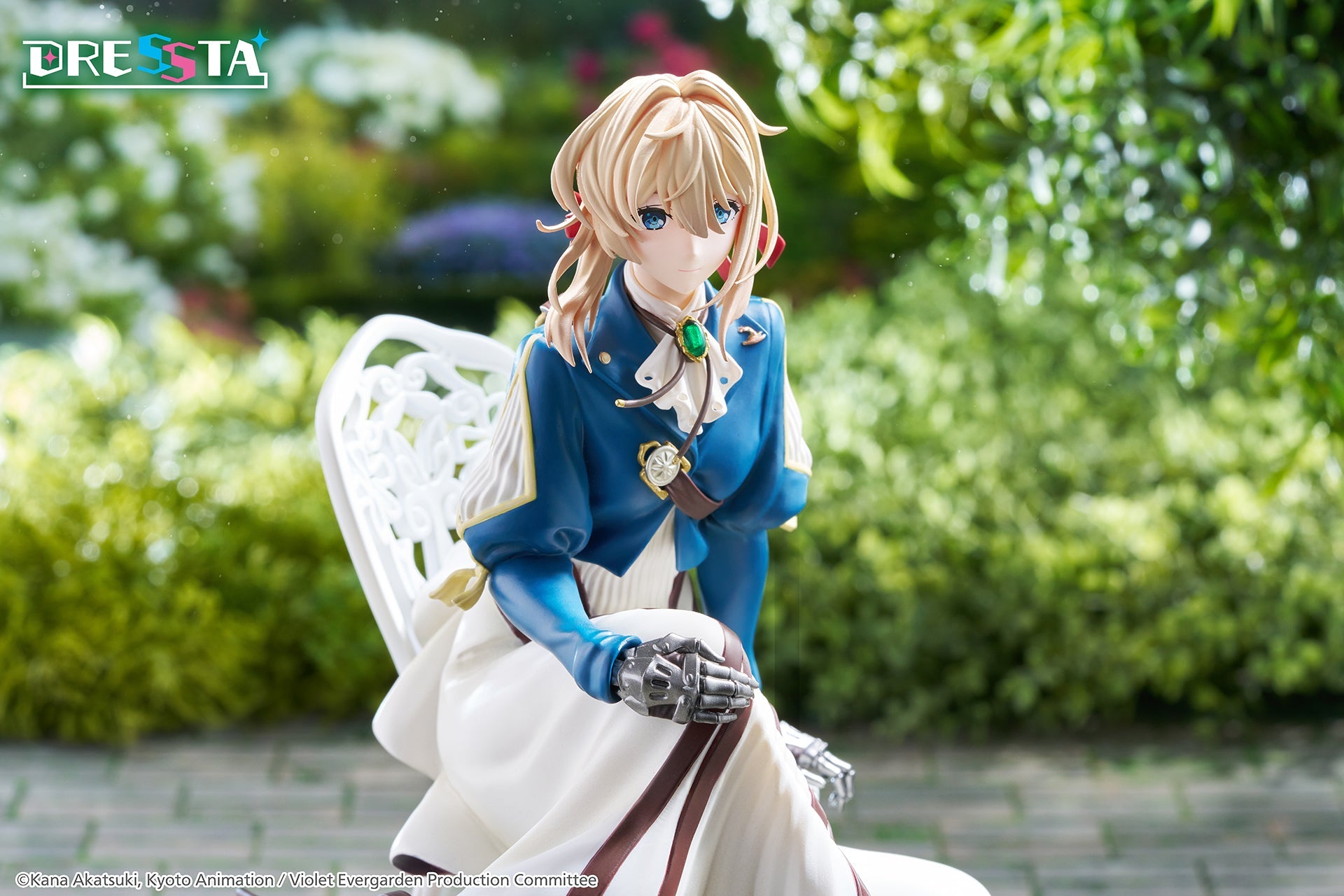 Close-up diorama view of Violet Evergarden focusing on her metallic prosthetic arm resting on her lap