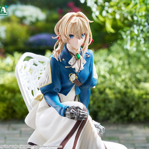 Close-up diorama view of Violet Evergarden focusing on her metallic prosthetic arm resting on her lap