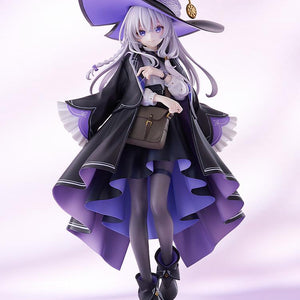 Front view of Elaina 1/7 scale figure in her pointed witch hat and black cloak with purple lining on a soft lavender background.