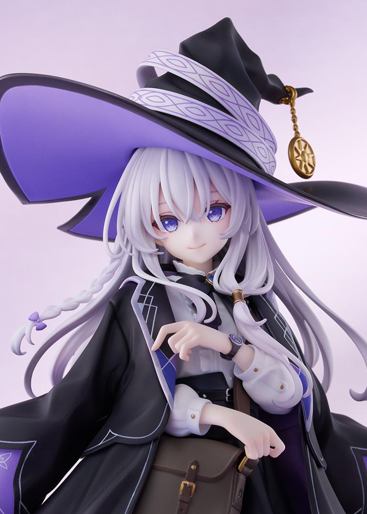 Upper body close-up of Elaina smiling in her witch attire with gold hat charm and detailed shirt ruffles.