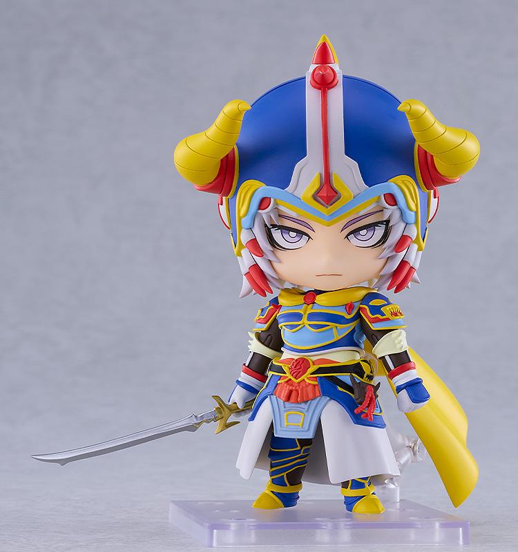 The Warrior of Light Nendoroid standing on a clear display base with a serious face plate and yellow cape.