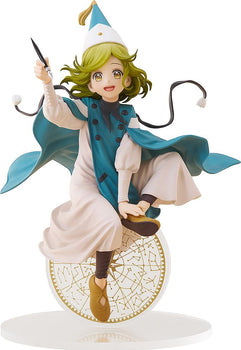 Studio front view of the Witch Hat Atelier Coco POP UP PARADE L size figure showing her green hair, pointed witch hat, and teal cape while holding a magic ink pen.