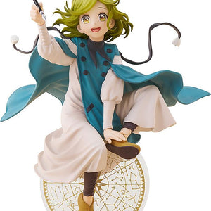 Studio front view of the Witch Hat Atelier Coco POP UP PARADE L size figure showing her green hair, pointed witch hat, and teal cape while holding a magic ink pen.