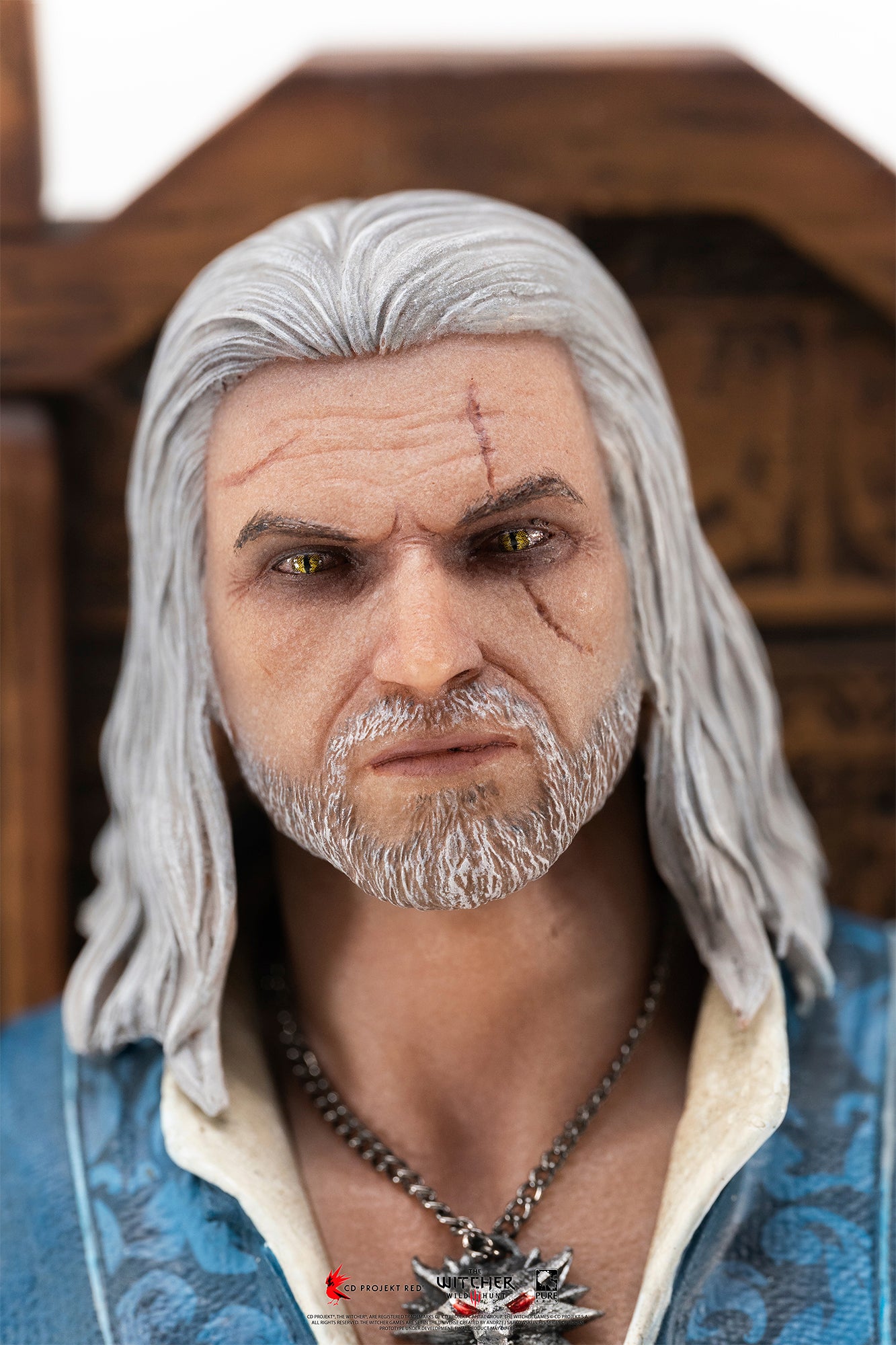 Hyper-detailed portrait sculpt of Geralt of Rivia featuring white hair, facial scars, and yellow cat eyes.