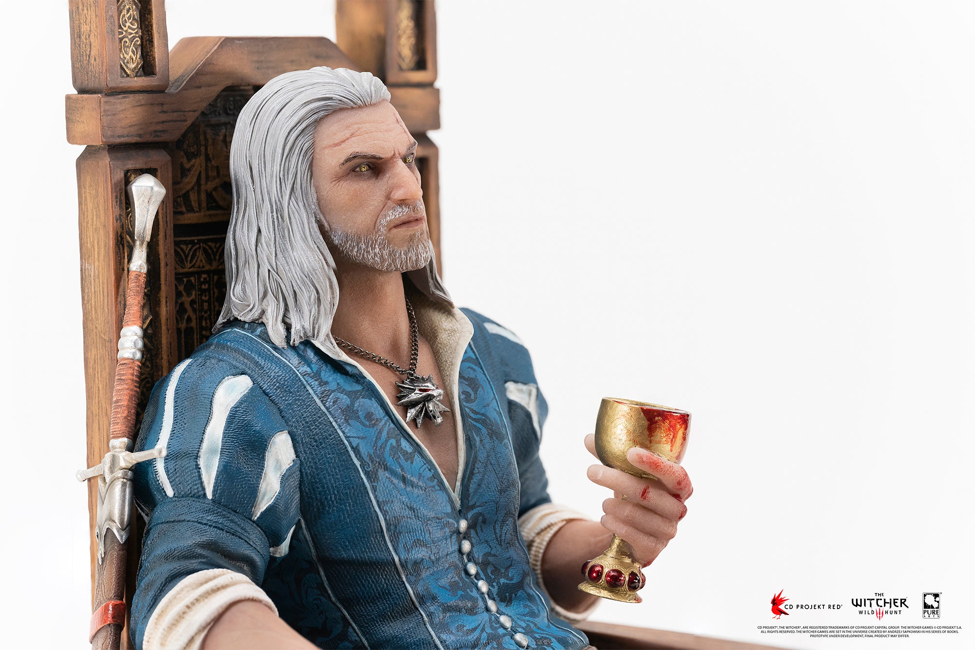 Medium portrait shot of Geralt sitting on a high-backed wooden throne in his blue Blood and Wine doublet holding a chalice.