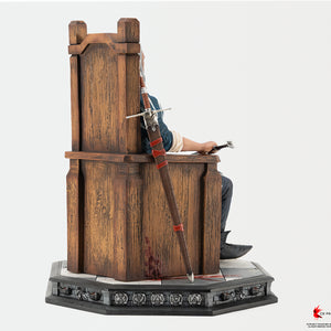 Rear three-quarter perspective of the PureArts Geralt statue showing the wooden throne back and scabbard placement.