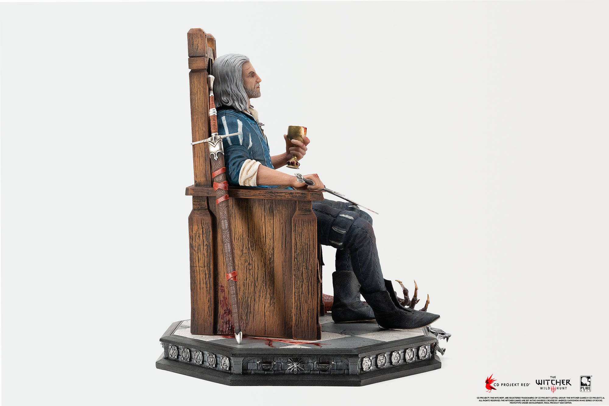 Right side profile view of the Geralt 1/6 scale statue showcasing the scabbard leaning on the throne and base dimensions.