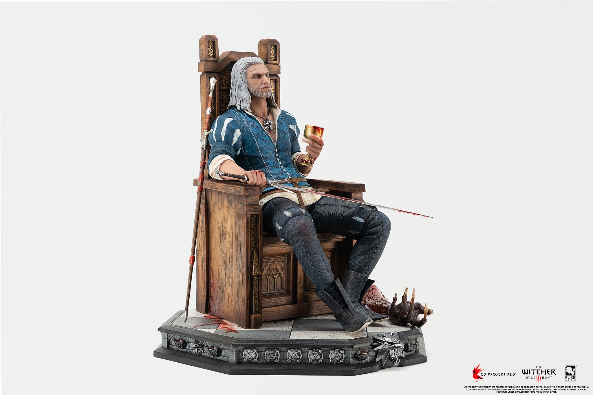 Three-quarter right angle full-body view of the Geralt on throne 1/6 scale statue.