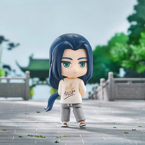 Outdoor diorama photo of the Wuxian NAZA T-Shirt Ver. Nendoroid figure standing on a stone courtyard path.