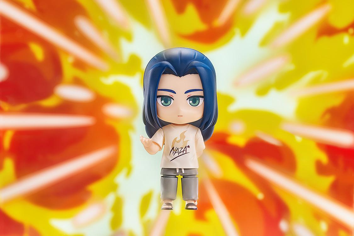 Dramatic promotional photo of the Wuxian Nendoroid figure set against a vibrant yellow and orange explosion backdrop.