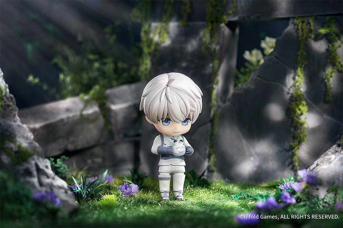 Love and Deepspace Xavier Nendoroid holding his signature white Bunbun plush.