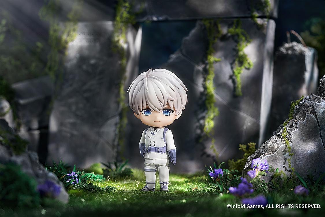 Xavier Nendoroid standing in a detailed forest environment with mossy ruins.