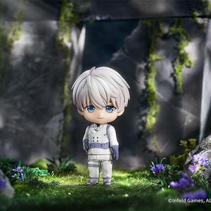 Xavier Nendoroid standing in a detailed forest environment with mossy ruins.