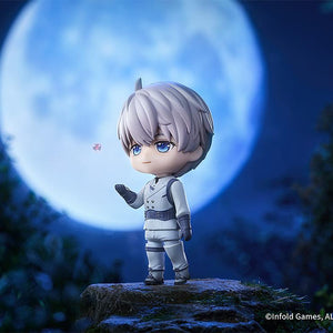 Xavier Nendoroid standing on a cliffside under a large bright full moon.