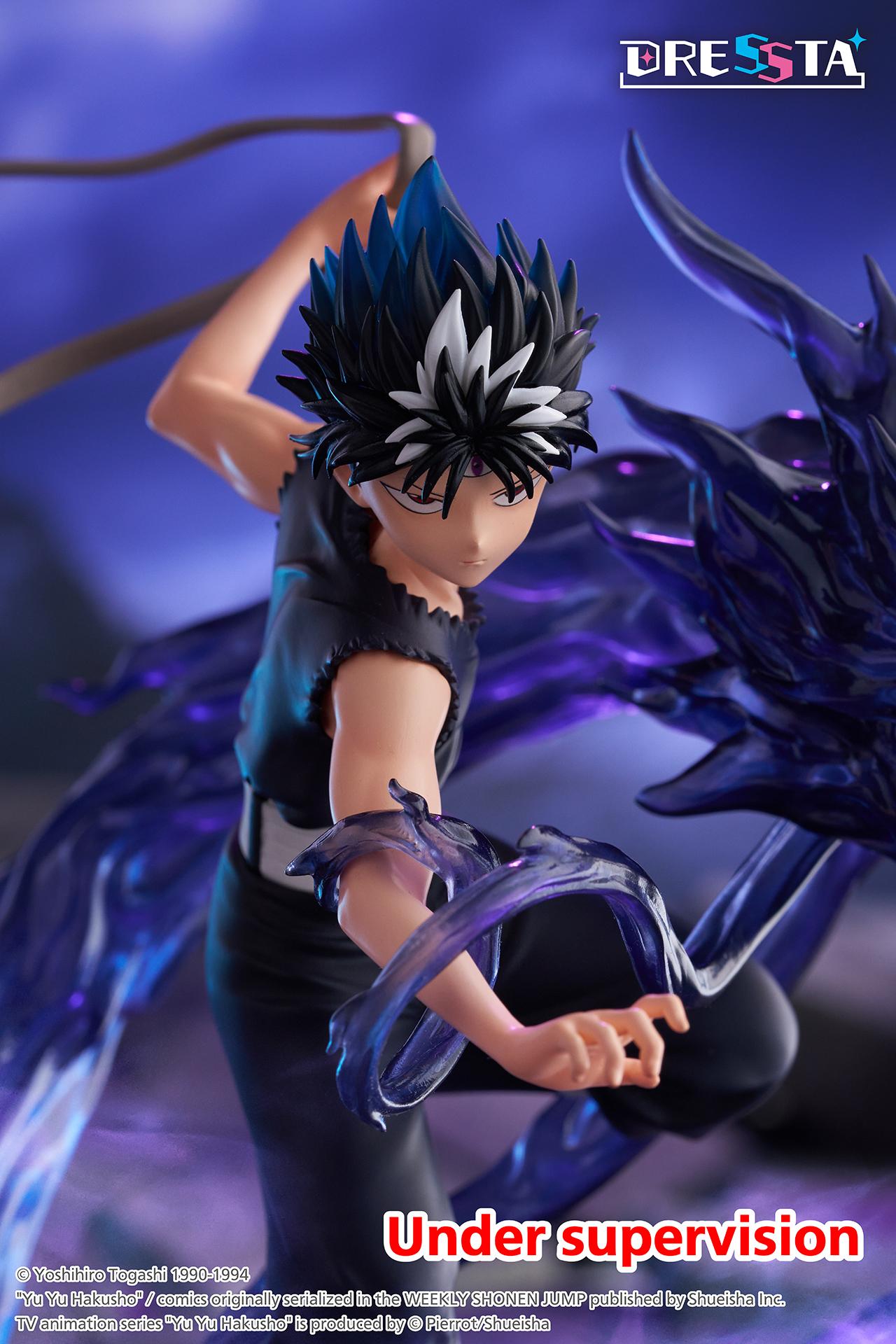 Vertical close-up action view highlighting Hiei's intense eyes, black wrist aura, and spiked black hair.