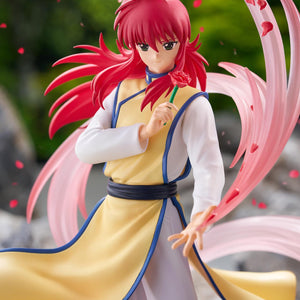 Close-up view of Kurama executing the Fuka Enbu Jin technique against a scenic mountain and forest background.