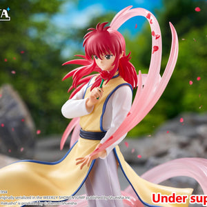 Side three-quarter action shot of Kurama unleashing rose petal storm power outdoors in a scenic rocky setting.