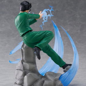 Rear back view of Yusuke Urameshi DRESSTA figure showing green uniform sculpt, hair details, and rock diorama base.