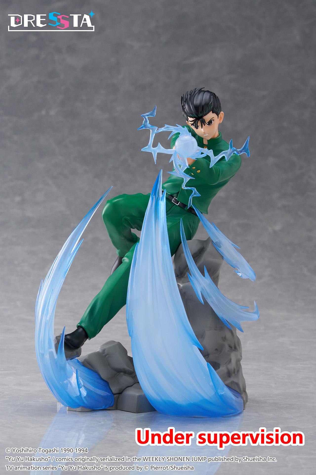 Yu Yu Hakusho Yusuke Urameshi DRESSTA figure unleashing Spirit Gun attack with translucent blue energy effects on rocky base.