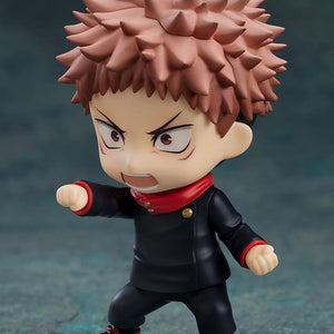 Action pose of the Yuji Itadori Nendoroid using the combat expression face plate and a punching gesture.