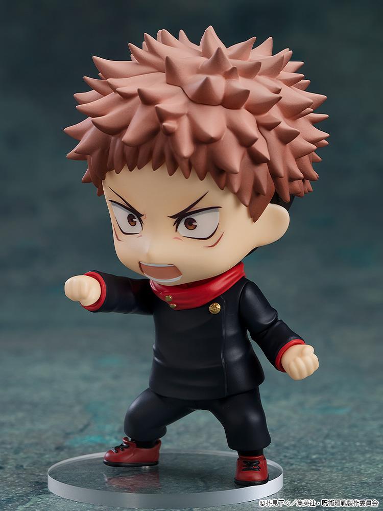 Action pose of the Yuji Itadori Nendoroid using the combat expression face plate and a punching gesture.