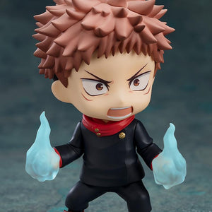 Close-up of Yuji Itadori Nendoroid with a shouting combat face plate and glowing blue effect parts.