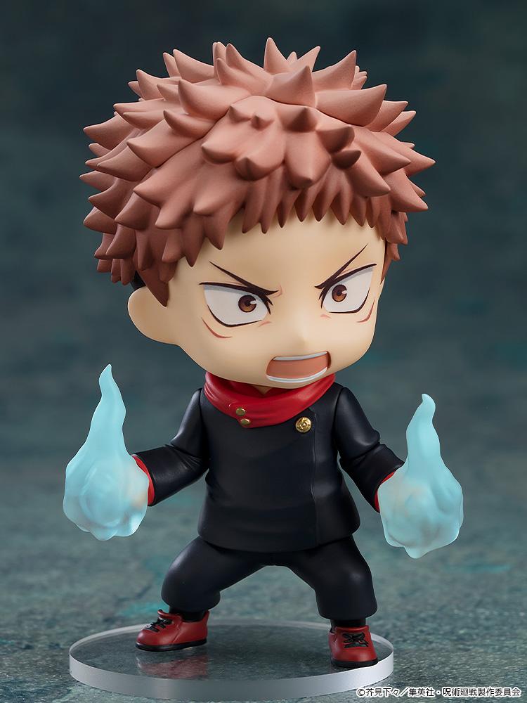 Close-up of Yuji Itadori Nendoroid with a shouting combat face plate and glowing blue effect parts.