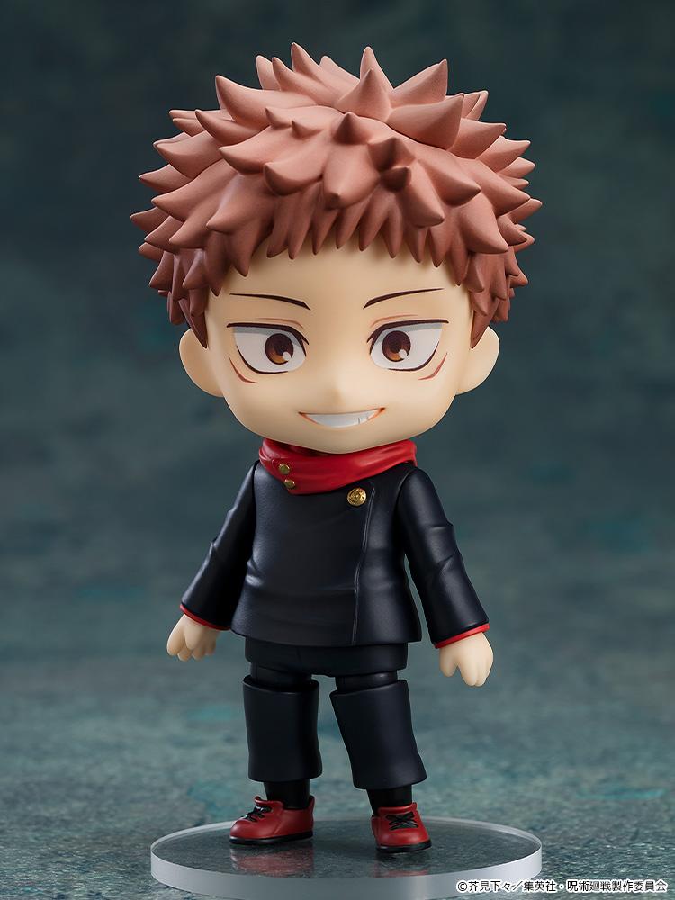 Yuji Itadori Nendoroid standing on a clear base featuring a bright smiling face plate.