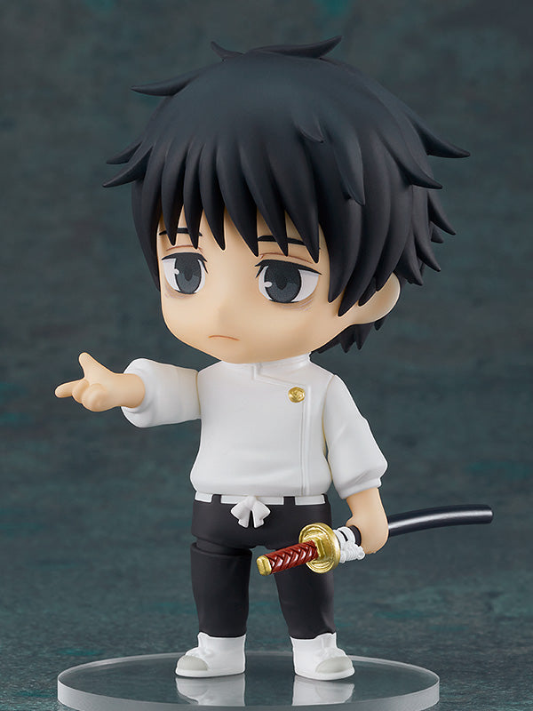 The Yuta Okkotsu Nendoroid posed holding his sheathed katana in one hand while pointing forward with his other hand.