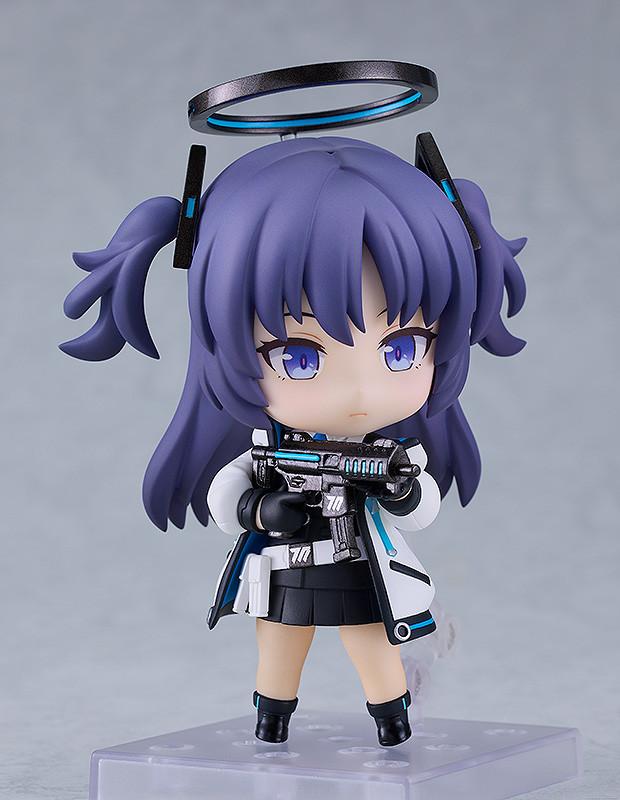 Yuuka Hayase Nendoroid in a combat pose holding a submachine gun, showcasing the Millennium Science School coat detail.