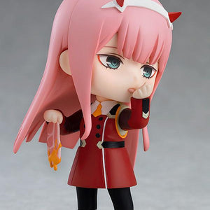 Recreation of the iconic bacon eating scene with the Zero Two Nendoroid holding honey-covered bacon.