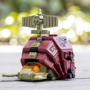 Kotobukiya Zoids D-Style Gustav Moonbay model kit displayed outdoors with blurred natural background