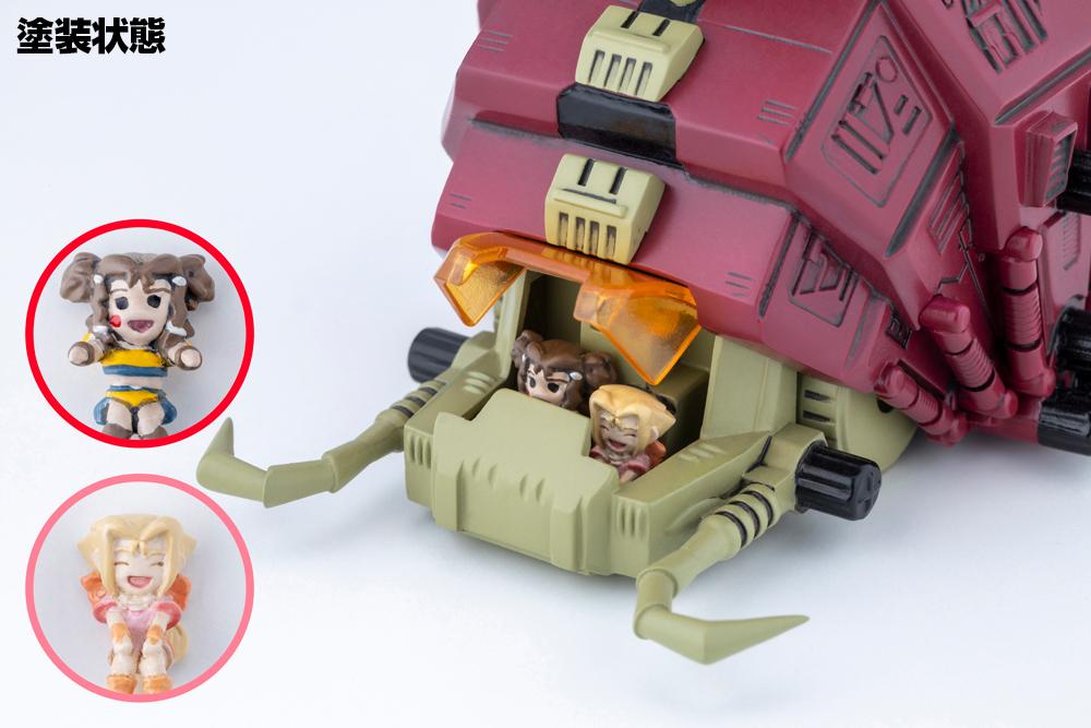 Detailed close-up view of painted Moonbay and Fine mini pilot figures seated inside the open Gustav cockpit