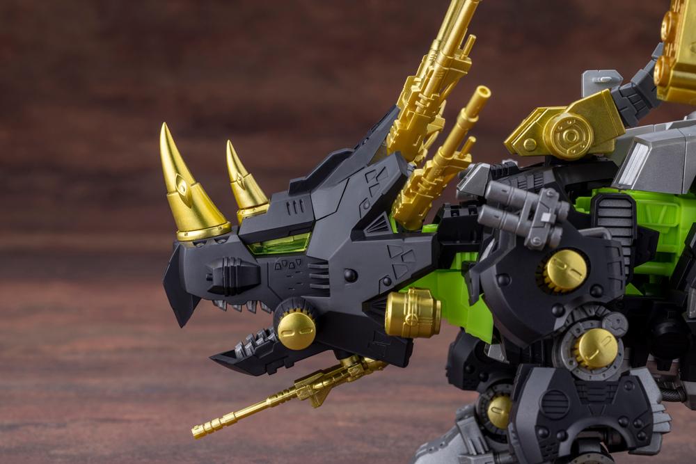 Close-up of Dark Horn Harry Special head sculpt showing golden dual horns, chin gun, and clear green cockpit canopy.