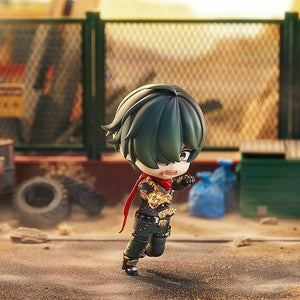 Action diorama shot of the Lighter Nendoroid figure running forward with his golden boxing glove in a desert scrapyard setting.