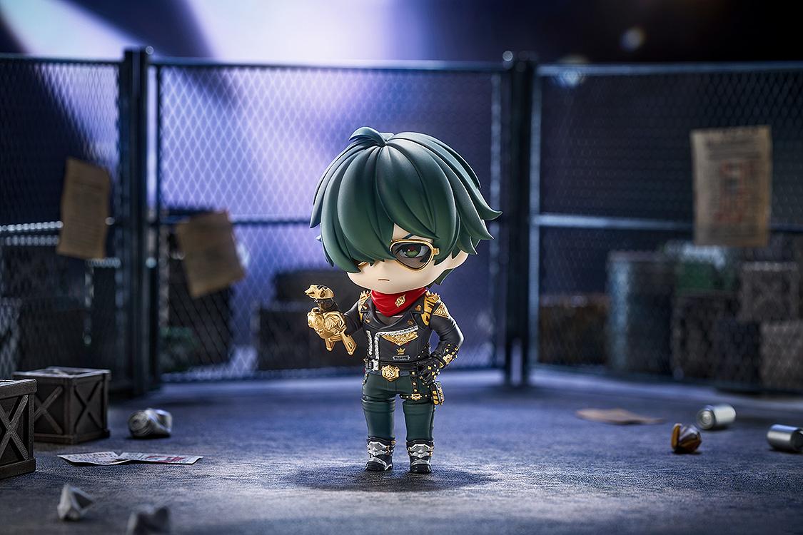 Studio diorama background showcasing the Lighter Nendoroid figure holding his gold championship belt prop inside a fenced area.